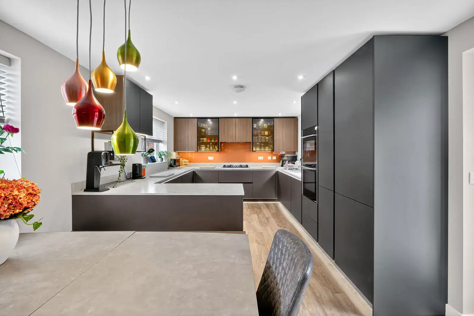 Sleek Handleless Kitchen Case Study designed and installed by House of Harmony