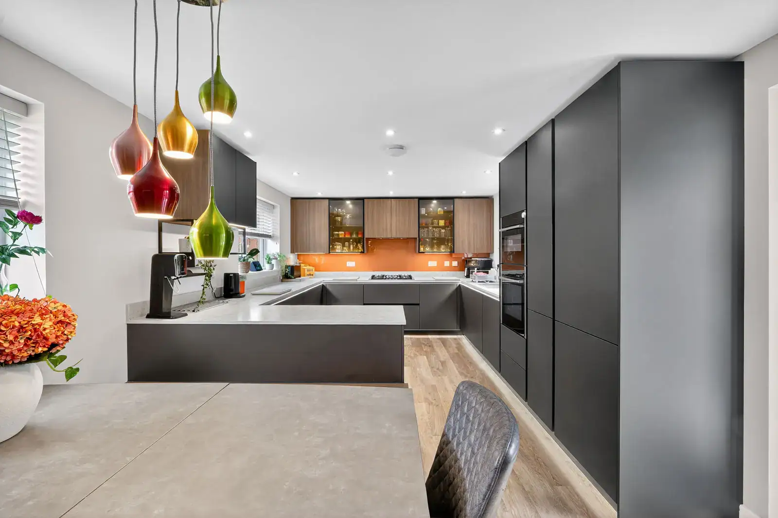 Sleek Handleless Kitchen Case Study designed and installed by House of Harmony