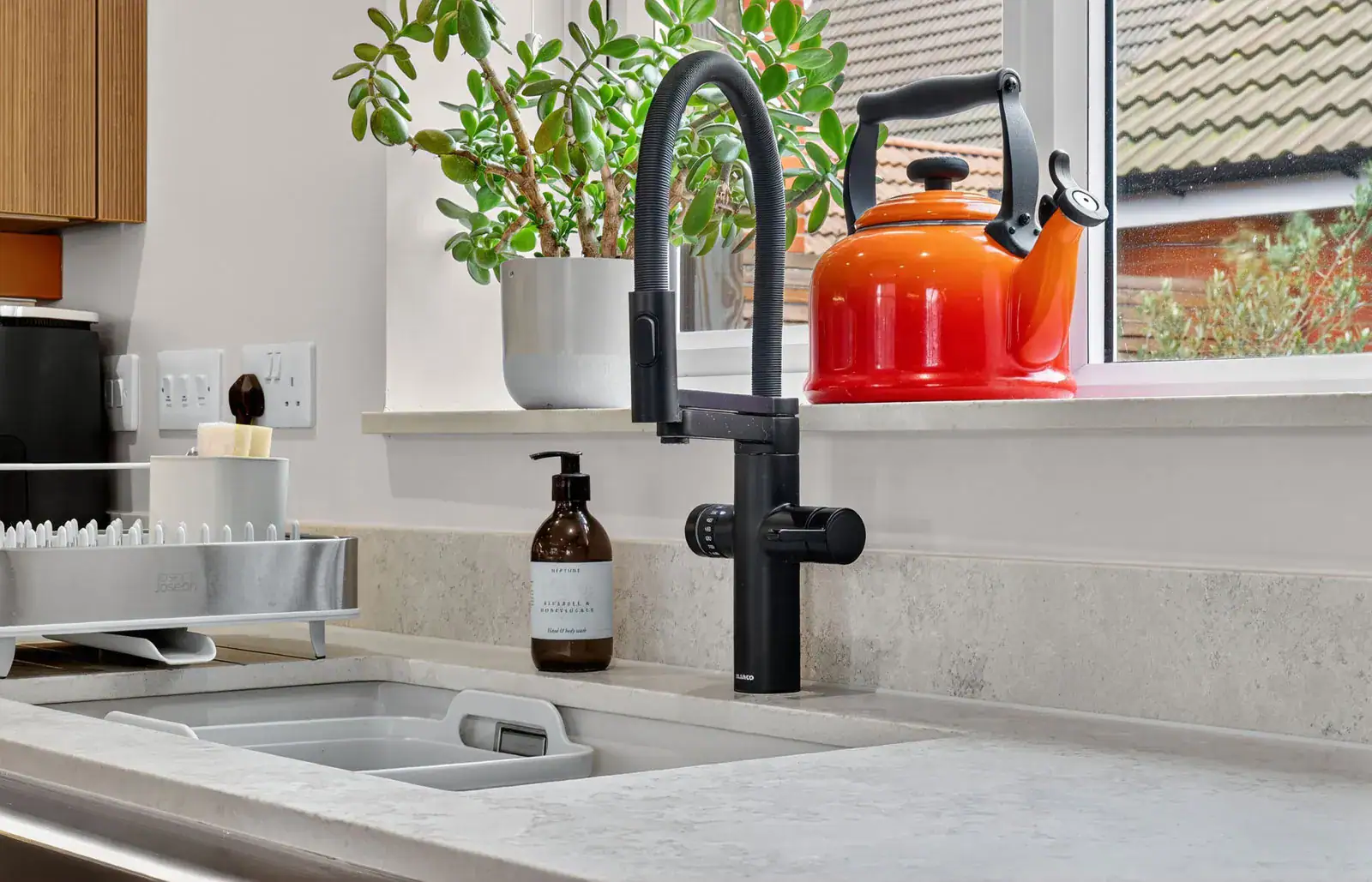 Sleek Handleless Kitchen Case Study designed and installed by House of Harmony