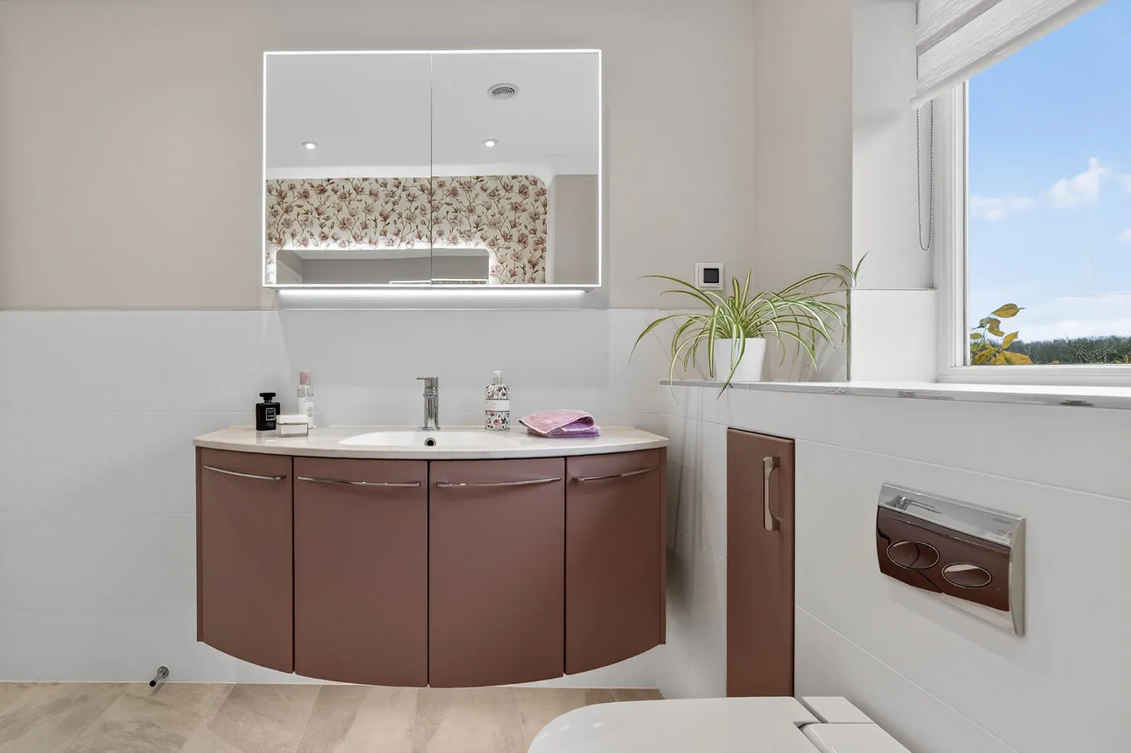 Warm and Contemporary Bathroom designed and installed by House of Harmony
