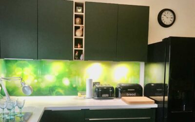 Siena matt velvet lacquer in Forest Green with stunning Corian worktops
