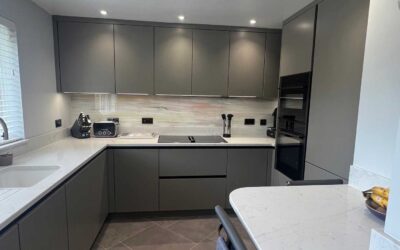 Sienna matt velvet lacquer handleless kitchen in terra grey with grab rail in onyx black installed in Soham