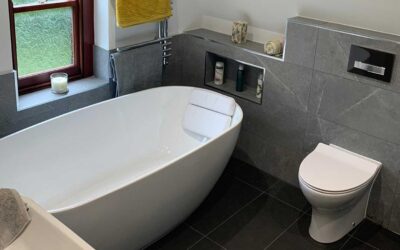 Wet room bathroom, wall mounted basin unit, Bauhaus WC, Kudos Ultimate 2 shower glass panels and freestanding Brook Bath